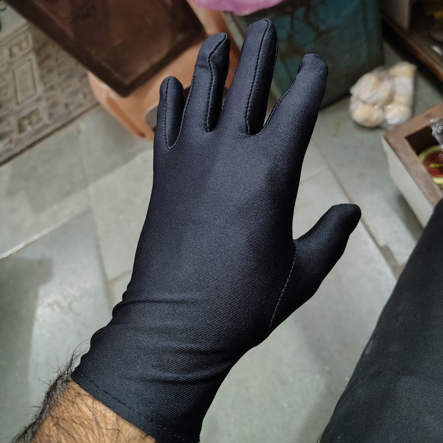Black Sunari Aujar gloves for jewellery display and product photography