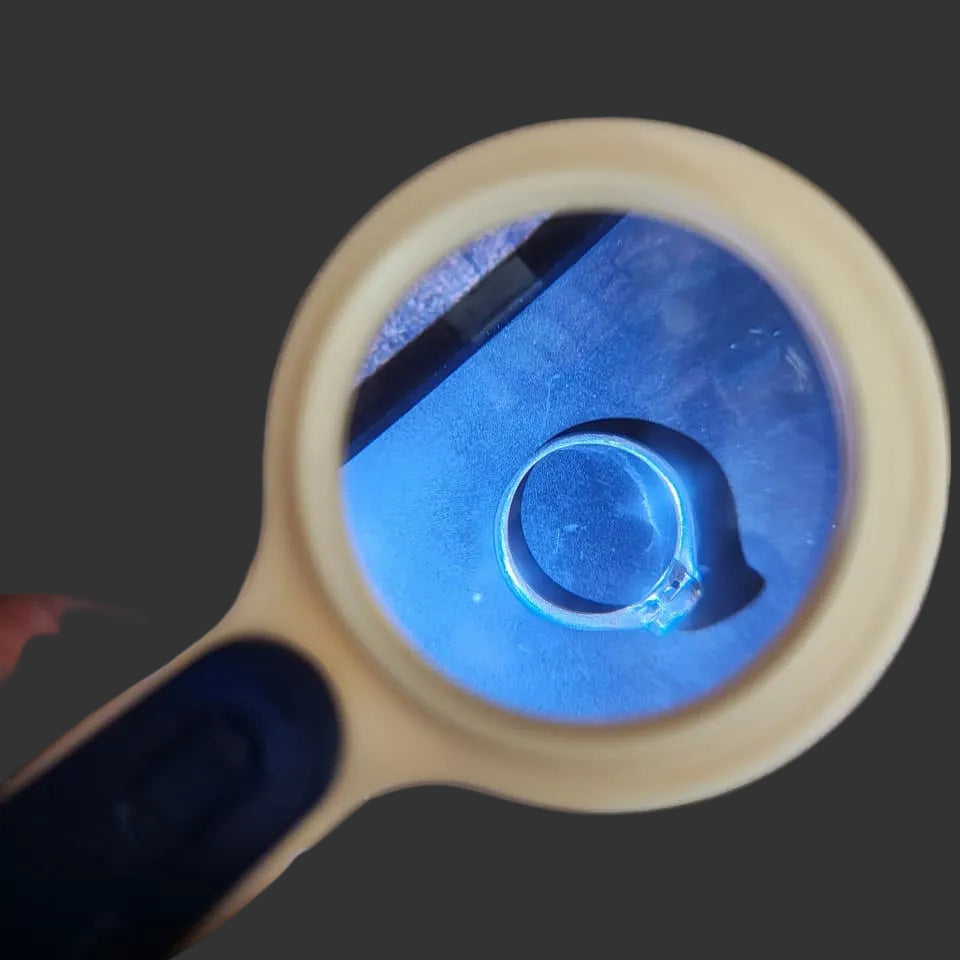 LED magnifying glass for checking markings on gold and silver jewellery